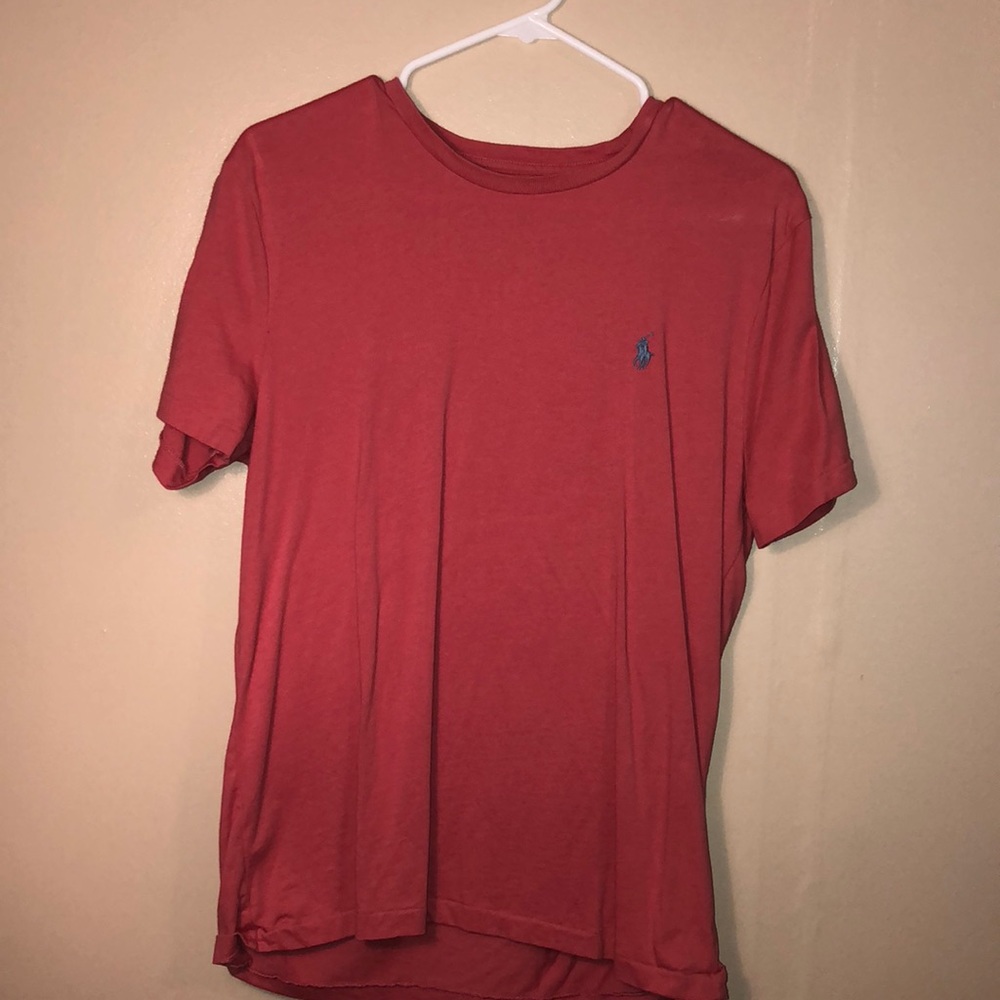 salmon colored polo shirt